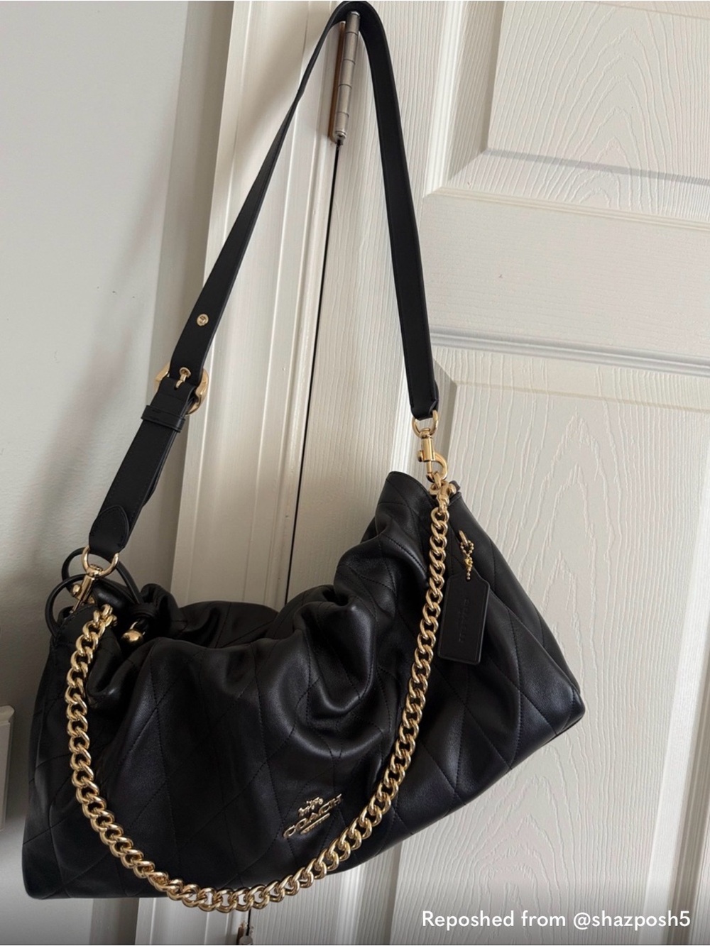 Coach Black Quilted Leather Shoulder Bag with Gold Chain Accent
